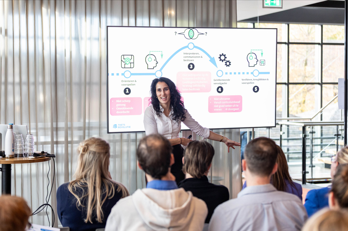 Valentina presenting the formative action loop to a school audience